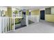 View of the property hallway featuring well-maintained walkways and unit entry doors at 1301 S Howard Ave # A22, Tampa, FL 33606