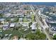 Wide aerial shot showcasing the neighborhood with canal access and boating docks at 13928 Raie Ave, Hudson, FL 34667
