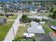 Aerial view of home showing boat parking along canal and a camper at 13928 Raie Ave, Hudson, FL 34667