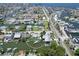 Aerial view of home with waterfront access to the Gulf, a boat lift, and circular boundary line at 13928 Raie Ave, Hudson, FL 34667