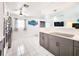 Well-equipped kitchen with stainless steel appliances, dual ovens, and stylish cabinetry for efficient cooking at 13928 Raie Ave, Hudson, FL 34667