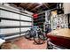 A garage featuring two bicycles, lots of storage, and access to the home at 13978 Barbados Dr, Seminole, FL 33776