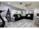 Comfortable living room with leather sofas and neutral decor at 13978 Barbados Dr, Seminole, FL 33776