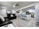 Spacious open-concept living area flows into the kitchen with modern appliances at 13978 Barbados Dr, Seminole, FL 33776