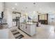 Open-concept kitchen boasts a large island, granite countertops, and stainless steel appliances at 14063 Wineberry Dr, Dade City, FL 33525