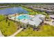 Community features pool and lake, with scenic views and well-maintained amenities at 14206 Covert Green Pl, Riverview, FL 33579