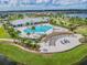 Aerial view of the community's clubhouse, pool, and outdoor gathering spaces at 14206 Covert Green Pl, Riverview, FL 33579