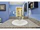 Clean bathroom featuring a vanity with granite countertop, and a well-lit mirror offering a view into another bathroom at 14206 Covert Green Pl, Riverview, FL 33579