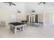 Community game room with a pool table, foosball, and ping pong, offering a fun space for residents at 14206 Covert Green Pl, Riverview, FL 33579