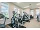 Bright and airy gym space with state-of-the-art cardio equipment and weight training machines at 14206 Covert Green Pl, Riverview, FL 33579