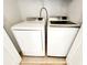 Laundry area with Samsung washer and dryer for efficient and convenient laundry care at 1427 Hillview Ln, Tarpon Springs, FL 34689