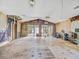 Spacious living room awaiting renovation with open floor plan at 14808 Lake Magdalene Cir, Tampa, FL 33613