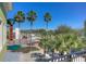 Town square featuring palm trees, fountain, park benches, colorful splashpad and the sign for 'Paul's Square Pizza' at 15309 Palomapark Ln, Lithia, FL 33547