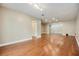 Inviting living room with hardwood floors and an open floor plan, great for entertaining at 15609 Gardenside Ln, Tampa, FL 33624