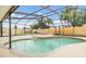Beautiful screened-in pool and spa with spacious deck, ideal for entertaining and relaxation at 15609 Gardenside Ln, Tampa, FL 33624