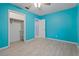 This bedroom features durable, light-toned floors and a closet, providing both style and practicality at 1579 Palmetto St, Clearwater, FL 33755