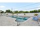 The backyard features a private pool, paved deck, and well-maintained landscaping at 1579 Palmetto St, Clearwater, FL 33755
