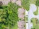 Aerial view of townhomes offers privacy with mature trees surrounding the community at 1712 Lake Cypress Dr # 1604, Safety Harbor, FL 34695