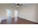 Spacious bedroom featuring hard wood floors and ample natural light at 1712 Lake Cypress Dr # 1604, Safety Harbor, FL 34695