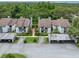 Charming townhomes feature well-maintained landscaping, covered parking, and inviting curb appeal at 1712 Lake Cypress Dr # 1604, Safety Harbor, FL 34695