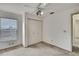 Bedroom featuring carpet flooring, window, closet, and ceiling fan at 1717 Osprey Ln, Lutz, FL 33549