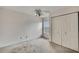 Bedroom with a large closet, ceiling fan and natural light from the window at 1717 Osprey Ln, Lutz, FL 33549