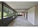 Extended enclosed lanai showcasing its ample space, perfect for entertaining and relaxation at 1717 Osprey Ln, Lutz, FL 33549