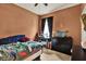 Cozy bedroom with a bed, workspace, and decor for a comfortable living space at 1737 Bonita Bluff Ct, Ruskin, FL 33570