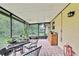 Inviting screened patio with brick flooring, ideal for outdoor dining and entertaining at 17706 Morninghigh Dr, Lutz, FL 33549
