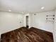 Bright bedroom with hardwood floors, offering natural light and closet space at 1813 E Wood St, Tampa, FL 33604