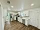Spacious kitchen with stainless steel appliances and wood-look flooring at 1813 E Wood St, Tampa, FL 33604
