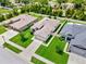 Overhead view of a lovely single-Gathering home showcasing its manicured yard and neighborhood layout at 19974 Bluebird Meadow Dr, Lutz, FL 33558
