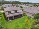 Aerial view of backyard, patio, and playset at 21797 Briske Morning Ave, Land O Lakes, FL 34637