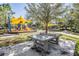 Community playground features ping pong and playground with slides and covered seating. Plenty of space to enjoy at 21797 Briske Morning Ave, Land O Lakes, FL 34637
