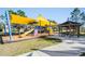 A covered playground features picnic tables and ample seating under a shady gazebo at 21797 Briske Morning Ave, Land O Lakes, FL 34637