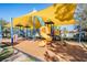 The playground features covered play structures and soft ground cover ensuring a fun and safe experience at 21797 Briske Morning Ave, Land O Lakes, FL 34637