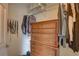 Walk-in closet featuring custom shelving and a built-in dresser, optimizing storage space at 2500 Winding Creek Blvd # G307, Clearwater, FL 33761