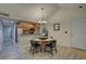 Open concept dining area near the kitchen with hardwood floors and bright natural light at 2500 Winding Creek Blvd # G307, Clearwater, FL 33761