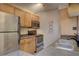 Functional kitchen with stainless steel appliances and light wood cabinets at 2500 Winding Creek Blvd # G307, Clearwater, FL 33761