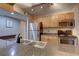 View of the kitchen featuring stainless steel appliances and light wood cabinets at 2500 Winding Creek Blvd # G307, Clearwater, FL 33761