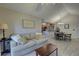 Open-concept living room boasts wood floors and a seamless transition to dining area and kitchen at 2500 Winding Creek Blvd # G307, Clearwater, FL 33761