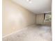 Spacious living room with ample natural light and neutral paint for a serene atmosphere at 2699 Seville Blvd # 207, Clearwater, FL 33764