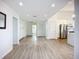 Bright, open living space with ample storage, lots of natural light, and access to the kitchen at 27466 Tierra Del Fuego Cir, Punta Gorda, FL 33983