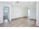 Neutral living room features built-in storage and durable flooring at 27466 Tierra Del Fuego Cir, Punta Gorda, FL 33983