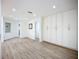 Neutral living room features durable flooring, lots of storage, and ample natural light at 27466 Tierra Del Fuego Cir, Punta Gorda, FL 33983