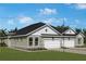 Charming single-Gathering home featuring a two-car garage and well-manicured lawn in a serene, suburban setting at 2797 Marrakesh Ln, Sarasota, FL 34234
