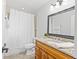 Bathroom featuring granite countertops and a shower with white curtain at 2902 W Lemon St, Tampa, FL 33609
