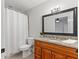 Bathroom featuring granite countertops and a shower with white curtain at 2902 W Lemon St, Tampa, FL 33609