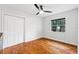Empty bedroom with hardwood floors and a large window at 2902 W Lemon St, Tampa, FL 33609