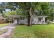 Charming single-story home with mature trees and updated landscaping at 2902 W Lemon St, Tampa, FL 33609